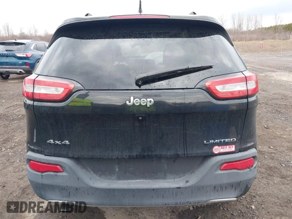 2014 Jeep Cherokee Limited with VIN 1C4PJMDB1EW156776, listed as a IAAI auction lot 41852167 with 130,514 mi miles and . Bid and sale history available at DreamBid. Image 17.