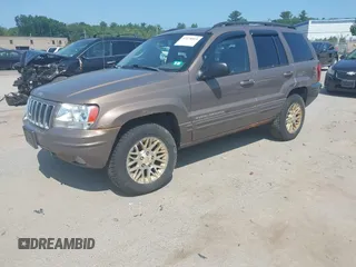 2002 Jeep Grand Cherokee Limited z VIN 1J8GW58N62C213751, wystawiony jako IAAI lot #42478869 z przebiegiem 233 848 mil mil oraz . Historia ofert i sprzedaży dostępna na DreamBid. Obrazek 2.