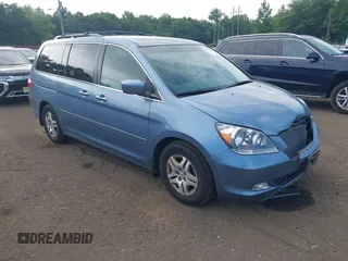 2006 Honda Odyssey EX-L z VIN 5FNRL38796B070284, wystawiony jako IAAI lot #42577690 z przebiegiem 153 949 mil mil oraz . Historia ofert i sprzedaży dostępna na DreamBid. Obrazek 1.