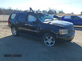 2011 Chevrolet Tahoe LTZ z VIN 1GNSCCE01BR361141, wystawiony jako IAAI lot #41282748 z przebiegiem Nie podano mil oraz . Historia ofert i sprzedaży dostępna na DreamBid. Obrazek 1.