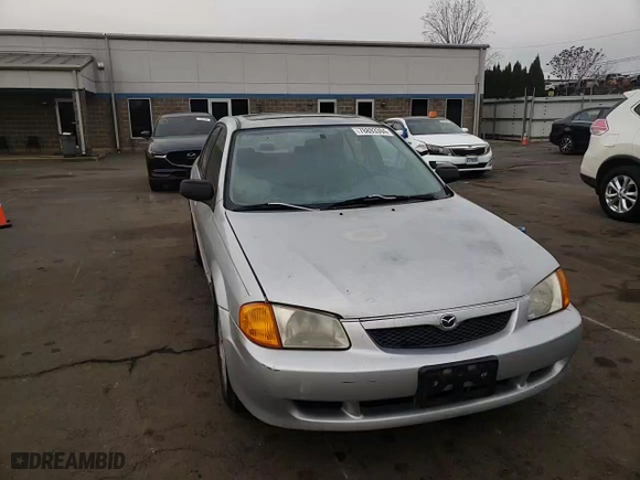 1999 Mazda Protege ES with VIN JM1BJ2218X0153260, listed as a Copart auction lot 78893394 with 196,034 mi miles and Salvage Title. Bid and sale history available at carsss.com. Image 11.