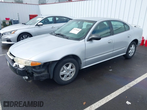 2003 Oldsmobile Alero GL1 z VIN 1G3NL52F93C310114, wystawiony jako IAAI lot #41778264 z przebiegiem Nie podano mil oraz . Historia ofert i sprzedaży dostępna na DreamBid. Obrazek 19.
