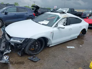 2014 Audi A7 Prestige z VIN WAU2GAFC7EN126780, wystawiony jako IAAI lot #42095865 z przebiegiem Nie podano mil oraz . Historia ofert i sprzedaży dostępna na DreamBid. Obrazek 17.