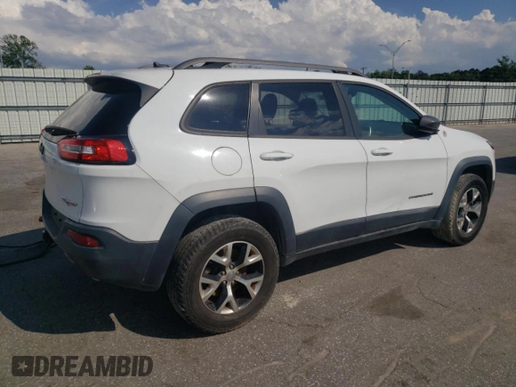 2014 Jeep Cherokee Trailhawk with VIN 1C4PJMBS5EW185510, listed as a Copart auction lot 55780005 with 130,358 mi miles and Clean title. Bid and sale history available at DreamBid. Image 3.