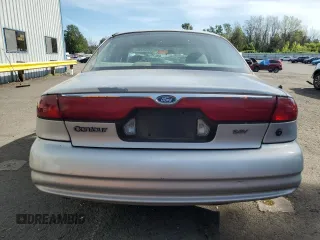 1998 Ford Contour LX with VIN 1FAFP66L2WK290948, listed as a Copart auction lot 56204295 with 76,307 mi miles and Salvage title. Bid and sale history available at DreamBid. Image 6.