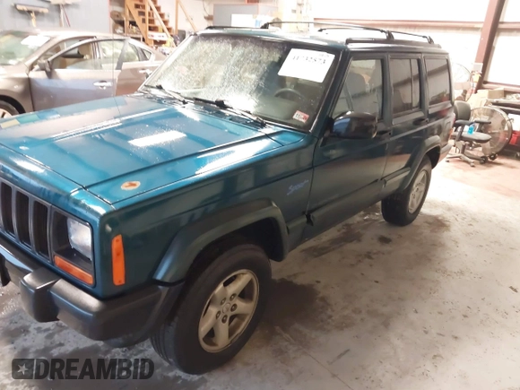 1997 Jeep Cherokee Sport with VIN 1J4FJ68S9VL594152, listed as a IAAI auction lot 41732573 with 65,316 mi miles. Bid and sale history available at carsss.com. Image 2.