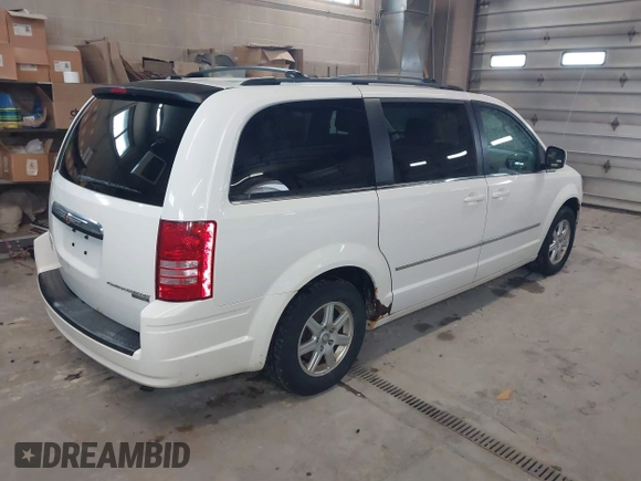 2010 Chrysler Town & Country Touring with VIN 2A4RR5D10AR369617, listed as a IAAI auction lot 42158748 with 174,437 mi miles and . Bid and sale history available at DreamBid. Image 4.