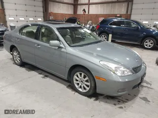 2004 Lexus ES 330 with VIN JTHBA30G145029731, listed as a IAAI auction lot 41874255 with 170,199 mi miles. Bid and sale history available at carsss.com. Image 1.