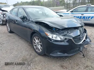 2016 Mazda 6 i Sport with VIN JM1GJ1U55G1461951, listed as a IAAI auction lot 41790268 with 98,567 mi miles and . Bid and sale history available at DreamBid. Image 1.