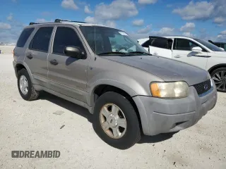 2001 Ford Escape XLT with VIN 1FMCU04101KF61126, listed as a Copart auction lot 76174744 with 0 mi miles and Salvage Title. Bid and sale history available at carsss.com. Image 4.