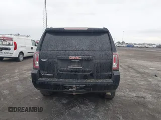 2016 GMC Yukon SLT with VIN 1GKS1BKC9GR480199, listed as a IAAI auction lot 41352032 with 146,716 mi miles. Bid and sale history available at carsss.com. Image 16.