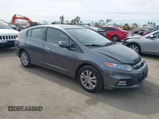 2012 Honda Insight EX z VIN JHMZE2H73CS000751, wystawiony jako IAAI lot #41687288 z przebiegiem 181 593 mil mil oraz . Historia ofert i sprzedaży dostępna na DreamBid. Obrazek 1.