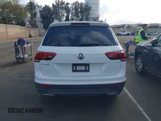 2019 Volkswagen Tiguan S with VIN 3VV1B7AX2KM039970, listed as a IAAI auction lot 41498706 with 56,907 mi miles and . Bid and sale history available at DreamBid. Image 16.
