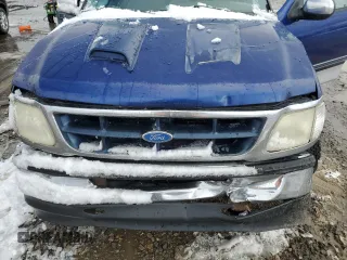 1997 Ford F-150 XL with VIN 1FTEX17LXVKB44786, listed as a Copart auction lot 49630955 with 301,736 mi miles and Salvage title. Bid and sale history available at DreamBid. Image 13.