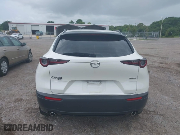 2023 Mazda CX-30 S with VIN 3MVDMBAM1PM511211, listed as a IAAI auction lot 42396707 with 49,469 mi miles and . Bid and sale history available at DreamBid. Image 16.