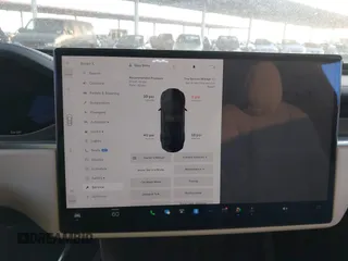 2022 Tesla Model X Plaid z VIN 7SAXCBE69NF352875, wystawiony jako IAAI lot #41964970 z przebiegiem 34 065 mil mil oraz . Historia ofert i sprzedaży dostępna na DreamBid. Obrazek 19.
