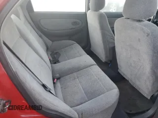 2001 Kia Sephia z VIN KNAFB121715066725, wystawiony jako Copart lot #86552964 z przebiegiem 76 915 mil mil oraz Tytuł czysty. Historia ofert i sprzedaży dostępna na DreamBid. Obrazek 10.
