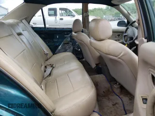 1997 Mitsubishi Galant ES z VIN 4A3AJ56G5VE019296, wystawiony jako Copart lot #56047635 z przebiegiem 87 533 mil mil oraz Szkoda całkowita • Salvage title. Historia ofert i sprzedaży dostępna na DreamBid. Obrazek 10.