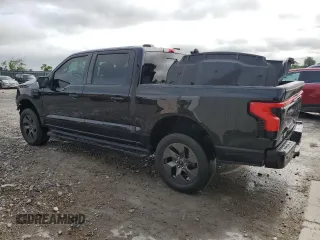 2022 Ford F-150 Lightning Pro with VIN 1FTVW1EL7NWG00726, listed as a Copart auction lot 57283755 with 55,672 mi miles and Salvage title. Bid and sale history available at DreamBid. Image 2.
