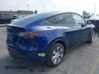 2023 Tesla Model Y Long Range z VIN 7SAYGDEE5PA102285, wystawiony jako IAAI lot #42402981 z przebiegiem 24 550 mil mil oraz . Historia ofert i sprzedaży dostępna na DreamBid. Obrazek 4.