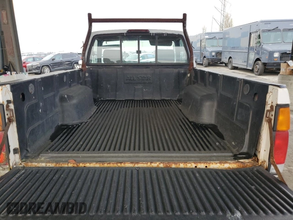 1995 Nissan Frontier with VIN 1N6SD11S3SC379478, listed as a Copart auction lot 52209415 with 21,068 mi miles and Salvage title. Bid and sale history available at DreamBid. Image 10.