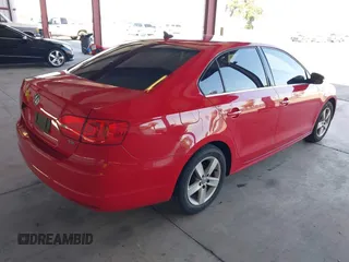 2013 Volkswagen Jetta TDI w/Premium with VIN 3VW3L7AJ2DM246343, listed as a IAAI auction lot 42157433 with 140,955 mi miles and . Bid and sale history available at DreamBid. Image 4.