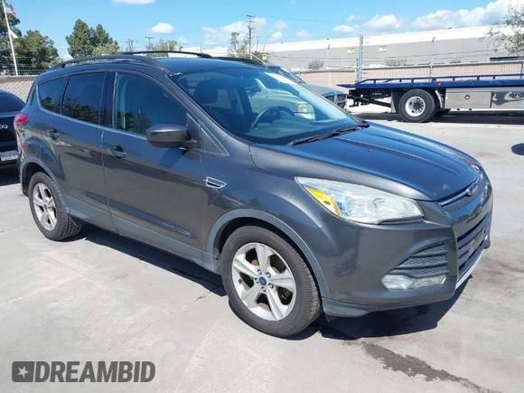 2015 Ford Escape SE with VIN 1FMCU0G78FUB96030, listed as a IAAI auction lot 41949876 with 172,940 mi miles. Bid and sale history available at carsss.com. Image 1.