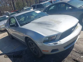 2010 Ford Mustang V6 with VIN 1ZVBP8AN0A5131024, listed as a IAAI auction lot 41779216 with 184,635 mi miles. Bid and sale history available at carsss.com. Image 1.
