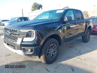 2024 Ford Ranger XLT with VIN 1FTER4GH0RLE22652, listed as a IAAI auction lot 41400573 with 7,823 mi miles. Bid and sale history available at carsss.com. Image 2.
