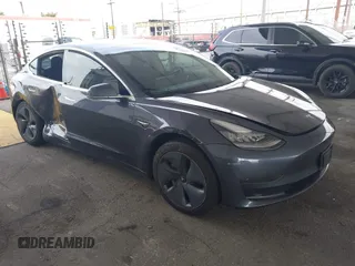 2020 Tesla Model 3 Standard Range Plus with VIN 5YJ3E1EA8LF743405, listed as a IAAI auction lot 41923592 with 81,901 mi miles. Bid and sale history available at carsss.com. Image 1.