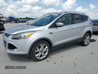 2015 Ford Escape Titanium with VIN 1FMCU0JXXFUB92120, listed as a Copart auction lot 56187405 with 120,265 mi miles and Clean Title. Bid and sale history available at DreamBid. Image 1.