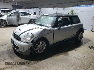 2012 MINI Hardtop S with VIN WMWSV3C56CTY28413, listed as a Copart auction lot 85219974 with 74,940 mi miles and Salvage Title. Bid and sale history available at DreamBid. Image 1.