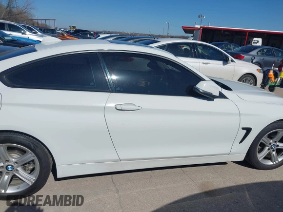 2014 BMW 4 Series 428i xDrive with VIN WBA3N9C58EF721369, listed as a IAAI auction lot 41768891 with 181,068 mi miles and . Bid and sale history available at DreamBid. Image 13.