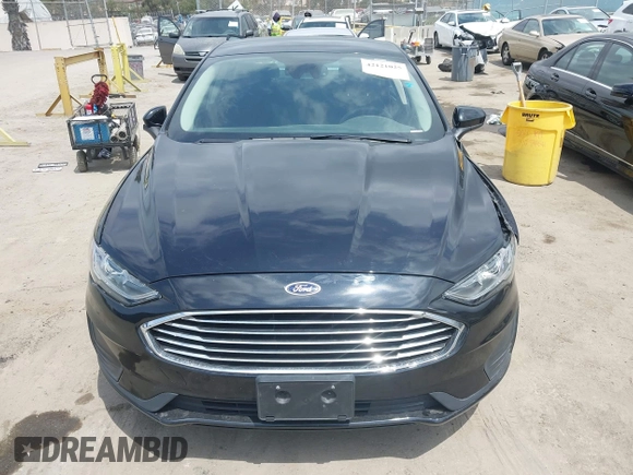 2020 Ford Fusion SE z VIN 3FA6P0LU7LR170922, wystawiony jako IAAI lot #42121025 z przebiegiem 115 799 mil mil oraz . Historia ofert i sprzedaży dostępna na DreamBid. Obrazek 12.