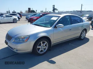 2002 Nissan Altima SE with VIN 1N4BL11E72C169164, listed as a IAAI auction lot 41992002 with 100,211 mi miles. Bid and sale history available at carsss.com. Image 18.