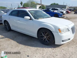 2013 Chrysler 300 Motown with VIN 2C3CCAAGXDH530004, listed as a IAAI auction lot 41973189 with 105,213 mi miles. Bid and sale history available at carsss.com. Image 1.