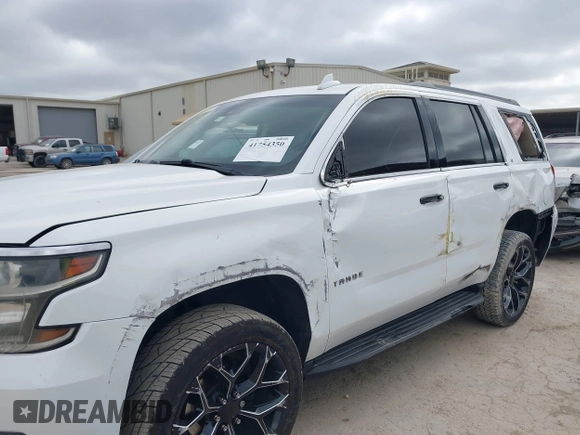 2015 Chevrolet Tahoe LT with VIN 1GNSCBKC4FR530776, listed as a IAAI auction lot 41754350 with 174,694 mi miles and . Bid and sale history available at DreamBid. Image 6.