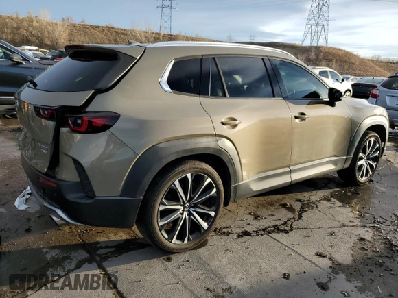 2023 Mazda CX-50 Premium Plus with VIN 7MMVABEYXPN110404, listed as a Copart auction lot 85310484 with 49,912 mi miles and Salvage Title. Bid and sale history available at DreamBid. Image 3.