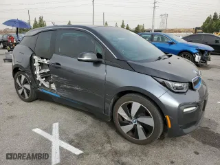2018 BMW i3 with VIN WBY7Z2C55JVE64933, listed as a Copart auction lot 62085683 with 47,998 mi miles. Bid and sale history available at carsss.com. Image 4.