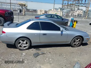 2001 Honda Prelude with VIN JHMBB62421C003129, listed as a IAAI auction lot 41989431 with 225,130 mi miles and . Bid and sale history available at DreamBid. Image 13.