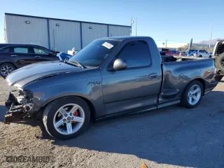 2003 Ford F-150 Lightning with VIN 2FTRF07313CA43362, listed as a Copart auction lot 87544765 with 98,589 mi miles and Salvage Title. Bid and sale history available at carsss.com. Image 1.