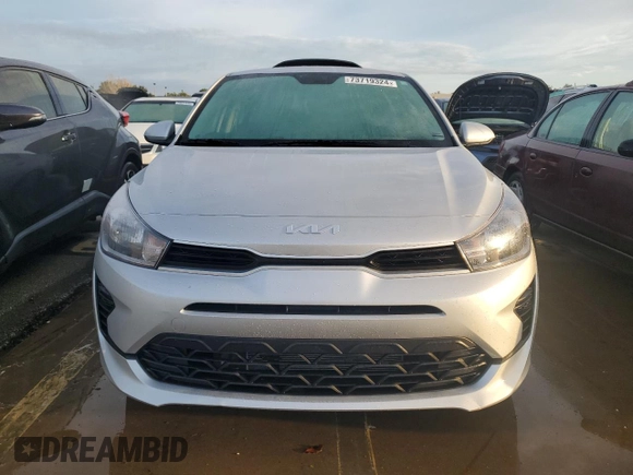 2023 Kia Rio S with VIN 3KPA24AD4PE629964, listed as a Copart auction lot 73719324 with 5,506 mi miles and Non Repairable. Bid and sale history available at DreamBid. Image 5.