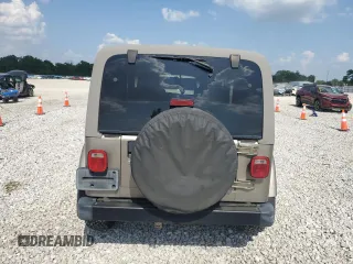 2003 Jeep Wrangler Sahara with VIN 1J4FA59S53P369077, listed as a Copart auction lot 61445025 with 147,904 mi miles and Clean title. Bid and sale history available at DreamBid. Image 6.