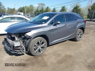2017 Lexus RX with VIN 2T2BZMCA5HC073937, listed as a IAAI auction lot 41966039 with 63,744 mi miles. Bid and sale history available at carsss.com. Image 2.