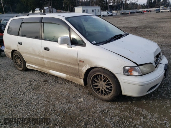 1998 Honda Odyssey with VIN RA31038664, listed as a Copart auction lot 43051785 with 106,084 mi miles and Salvage title. Bid and sale history available at DreamBid. Image 4.