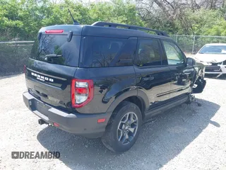 2021 Ford Bronco Sport Badlands z VIN 3FMCR9D98MRA67396, wystawiony jako IAAI lot #42080134 z przebiegiem 52 300 mil mil oraz . Historia ofert i sprzedaży dostępna na DreamBid. Obrazek 4.