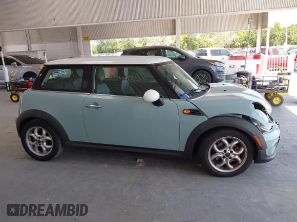 2012 MINI Hardtop with VIN WMWSU3C55CT261047, listed as a IAAI auction lot 42160995 with 123,879 mi miles and . Bid and sale history available at DreamBid. Image 14.