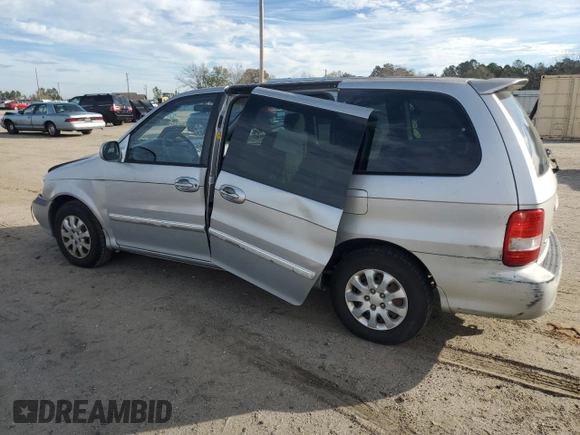2005 Kia Sedona LX with VIN KNDUP132X56721558, listed as a Copart auction lot 88574685 with 176,660 mi miles and Salvage Title. Bid and sale history available at carsss.com. Image 2.