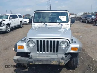 2005 Jeep Wrangler X с VIN 1J4FA39S95P338146, выставлен на аукционе IAAI как лот 42043816 с пробегом 80 937 миль миль и . История ставок и продаж доступна на DreamBid. Изображение 12.