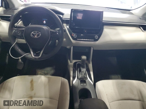 2023 Toyota Corolla Cross LE z VIN 7MUBAAAG4PV042580, wystawiony jako Copart lot #60788025 z przebiegiem 59 576 mil mil oraz Szkoda całkowita • Salvage title. Historia ofert i sprzedaży dostępna na DreamBid. Obrazek 8.
